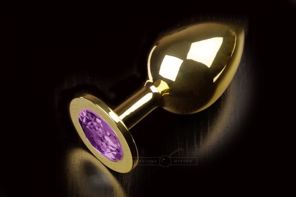 Большая золотистая анальная пробка с кристаллом (фиолетовый)
